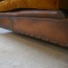 Banquette en cuir clouté vers 1920