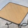 Paire de tables d'appoint en fer forgé et plateau en chêne travail français signé