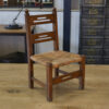 Chaise d'enfant en bois et assise en paille dans le goût de Charles Dudouyt 1950's