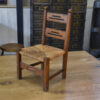 Chaise d'enfant en bois et assise en paille dans le goût de Charles Dudouyt 1950's