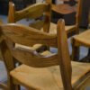 Ensemble de 6 chaises en chêne massif et assises en paille Guillerme et Chambron 1950's