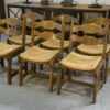 Ensemble de 6 chaises en chêne massif et assises en paille Guillerme et Chambron 1950's