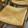 Ensemble de 6 chaises en chêne massif et assises en paille Guillerme et Chambron 1950's