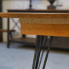 Table en chêne et pied en fonte et bronze design italien 1960's