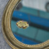 Paire de miroirs ovales vintage 1950's