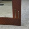 Miroir moderniste en placage d'acajou 1950's