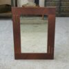 Miroir moderniste en placage d'acajou 1950's