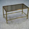Table basse en laiton et verre fumé 1950's