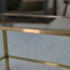 Table basse en laiton et verre fumé 1950's