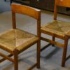 Ensemble de 4 chaises en orme massif et assise en jonc dans le goût Maison Regain 1960's