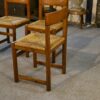 Ensemble de 4 chaises en orme massif et assise en jonc dans le goût Maison Regain 1960's