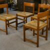 Ensemble de 4 chaises en orme massif et assise en jonc dans le goût Maison Regain 1960's