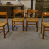 Ensemble de 4 chaises en orme massif et assise en jonc dans le goût Maison Regain 1960's