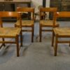 Ensemble de 4 chaises en orme massif et assise en jonc dans le goût Maison Regain 1960's