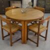 Table ronde en chêne massif par Maison Regain 1970's